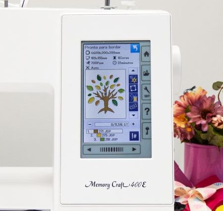 Janome MC400E colour touchscreen showing an embroidery design