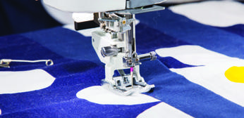 MC6700P AcuFeed Flex guiding fabric layers